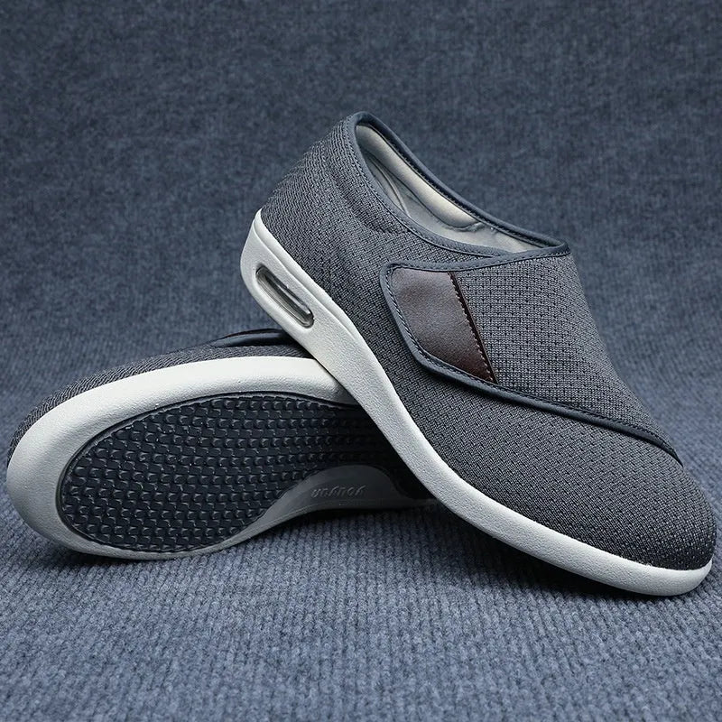 Casual beige leisure shoes with a velcro strap and round toe on a foam rubber sole.
