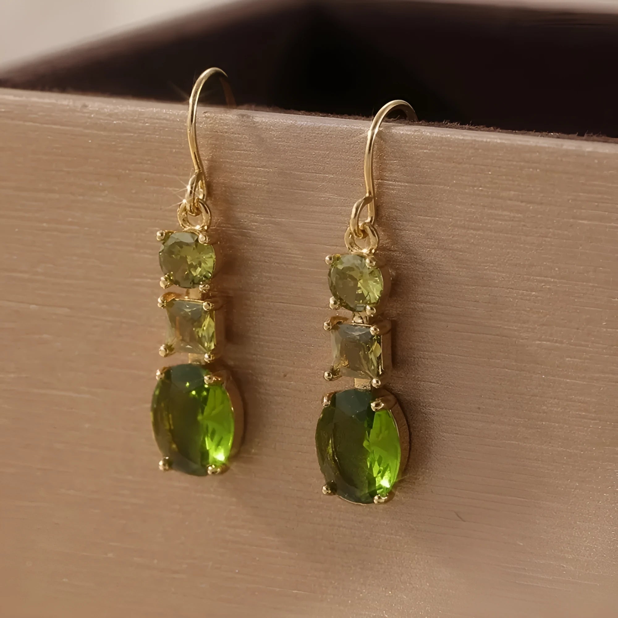 A pair of green copper geometric earrings with a quadrilateral shape and retro bohemian style.