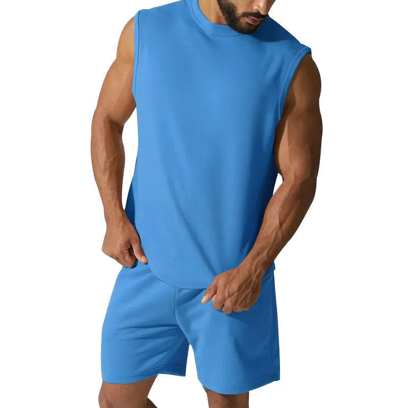 Men's sleeveless cotton blend sports set showing top and shorts in a solid colour.