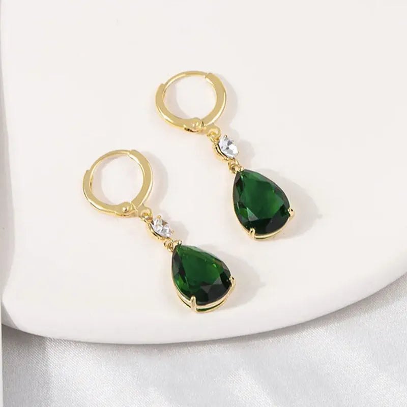 A pair of green geometric teardrop fashion earrings made from alloy.