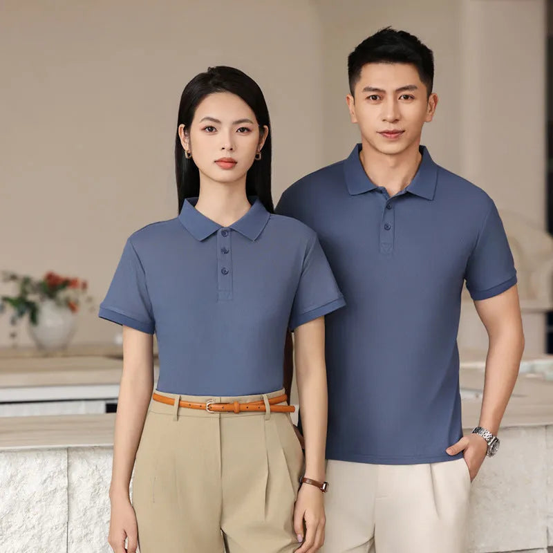 White short sleeve cotton polo shirt for staff uniforms on a hanger, showing slit style and button placket.