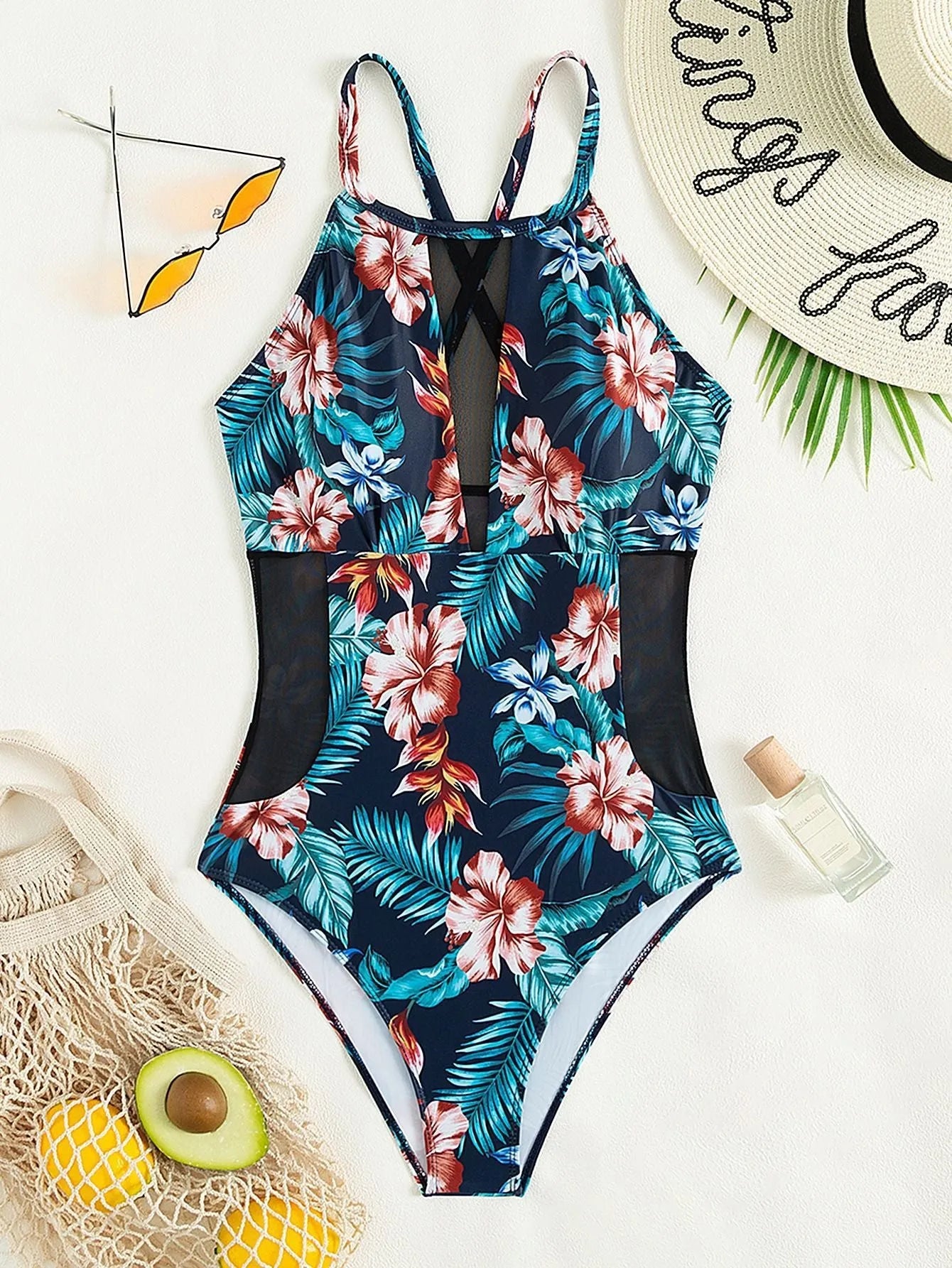 Women's deep V-neck one-piece swimsuit in a solid colour or gradient pattern.