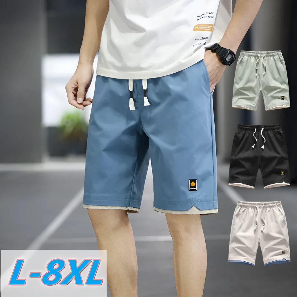 Man's loose-fit casual beach shorts in khaki colour with elasticated waistband.