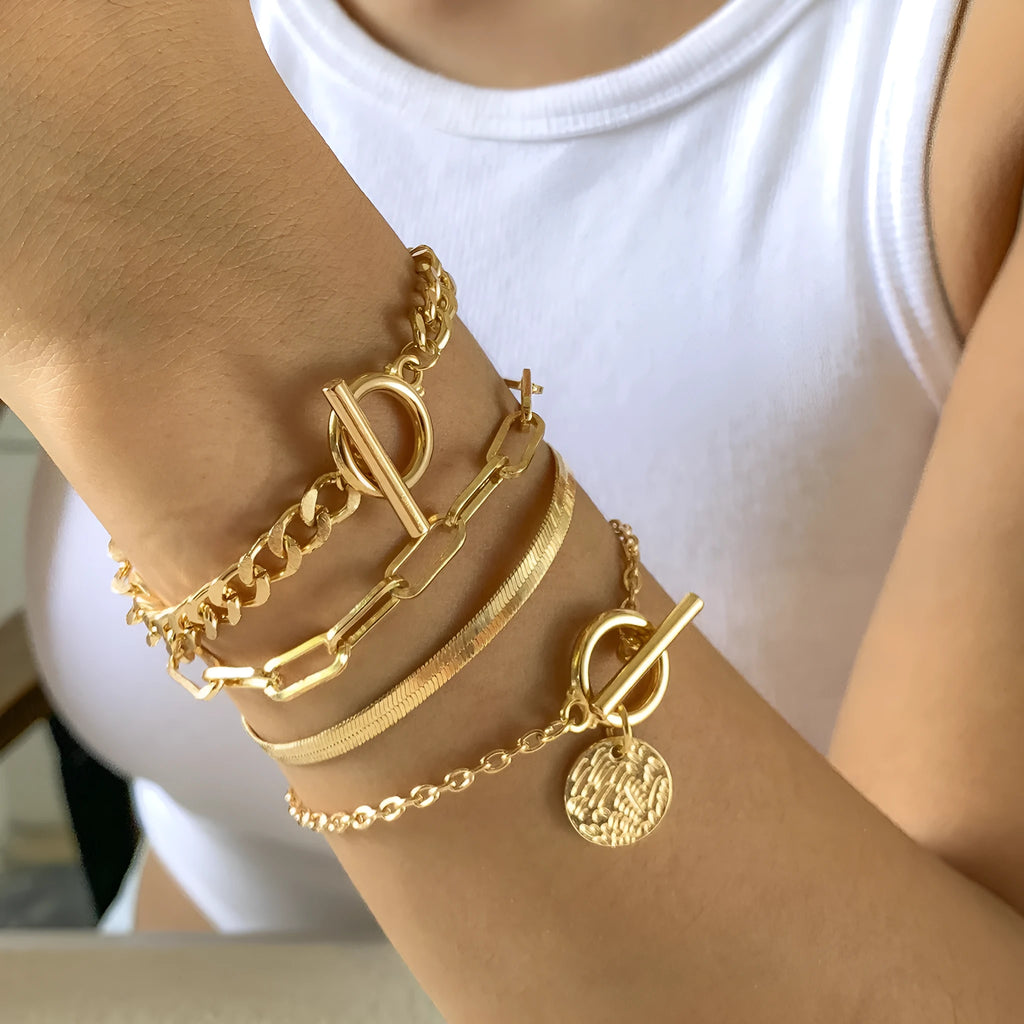 Set of 4 metal chain bracelets in gold or silver with snake bone and hollow chain designs