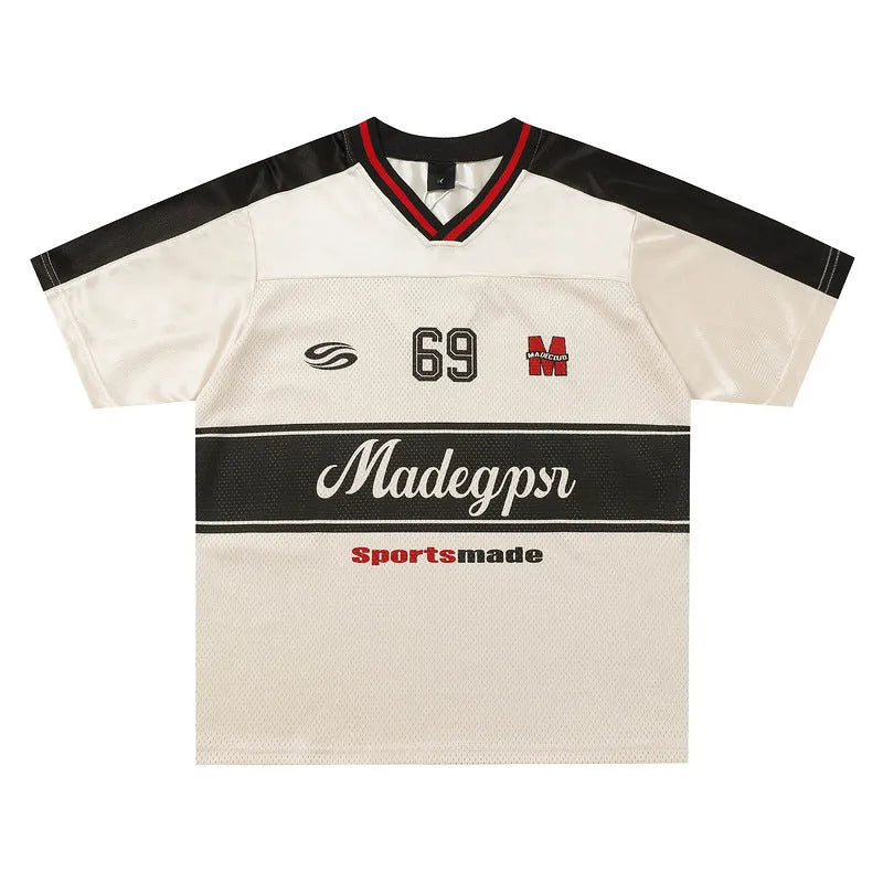 Apricot coloured men's V-neck loose sports jersey with letter print and drop shoulder sleeves.