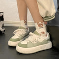Green women's casual flat shoes with mesh material and round toe design