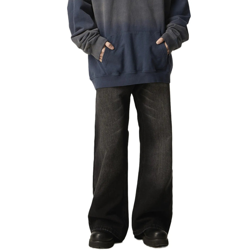 Black loose straight retro jeans with zipper fly on size chart background