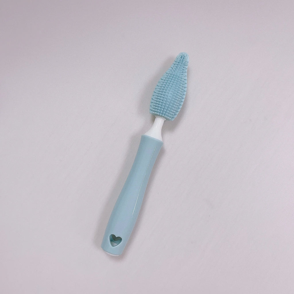 Silicone baby bottle brush cleaning set in blue, pink, and yellow colours