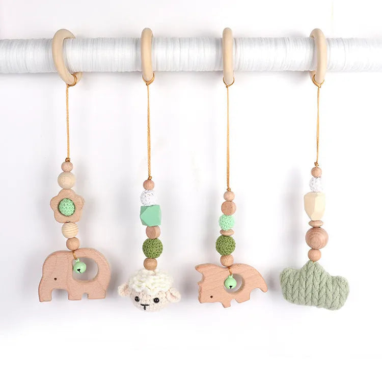 Beech wood baby rattle toy with animal decoration, 28cm long, available in six colours