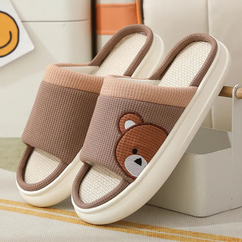 Cartoon bear cotton linen indoor slippers with PVC non-slip sole, shown in orange, pink, silver grey, and light brown