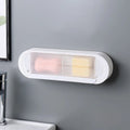Green large ABS plastic drain soap box with lid on a bathroom counter
