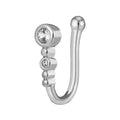Copper U-shaped nose ring with zircon micro inlay, white K electroplated finish, shown on a flat surface