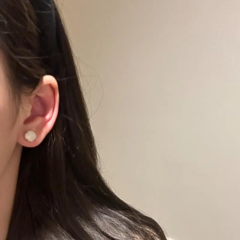 Copper four-claw chalcedony stud earrings in geometric round shape with national fashion style