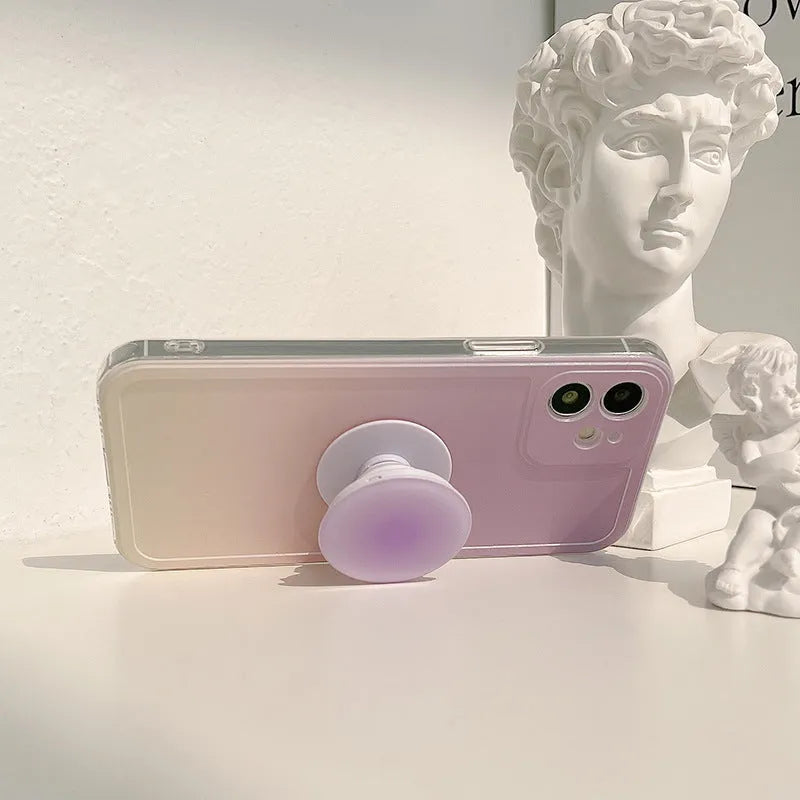 Yellow and purple gradient silicone iPhone case with a retractable X bracket extended.