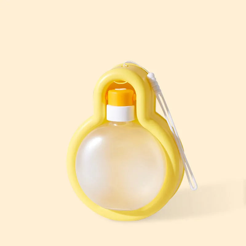 Green 2-in-1 dog travel water bottle with pull-out drinking bowl, shown with size dimensions.