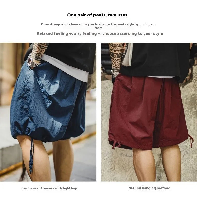 Prussian blue men's nylon beach shorts with loose fit and embroidered detail