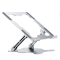 Grey adjustable aluminium laptop stand in open and folded positions on a wooden desk.
