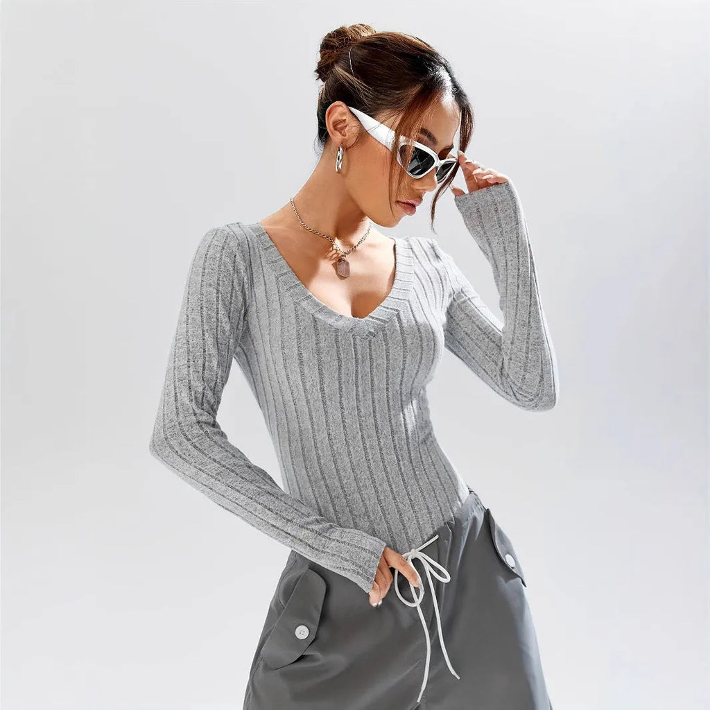Women's deep V-neck long sleeve jumpsuit with shorts in solid light gray, black, or rose red, slim fit