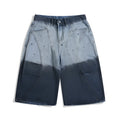Blue tie-dye gradient cropped jeans with a washed-out finish and loose fit.