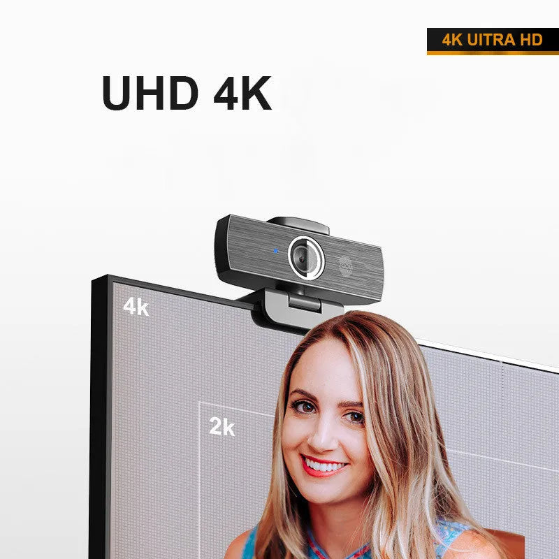 Black USB webcam with magnetic privacy cover on a desk, showing 1.7m cable.
