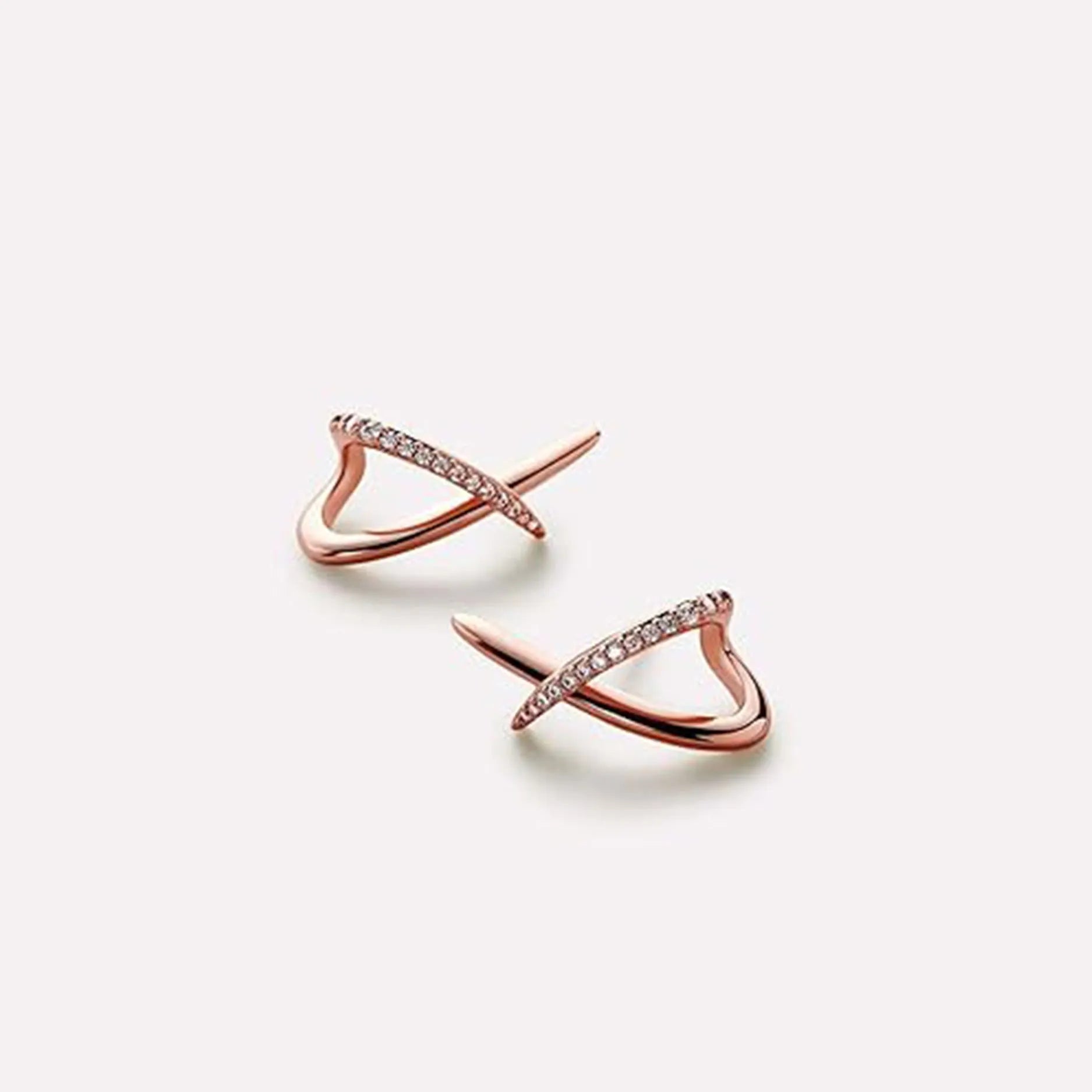 Zinc alloy geometric clip-on earrings in gold, silver, and rose gold on white background