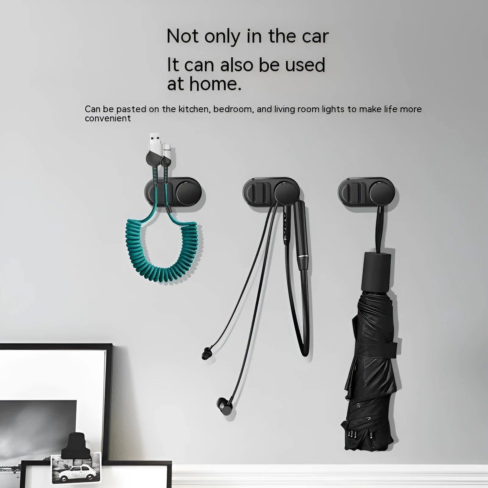 Car data cable storage hook in dark green with adhesive mount for vehicle interiors