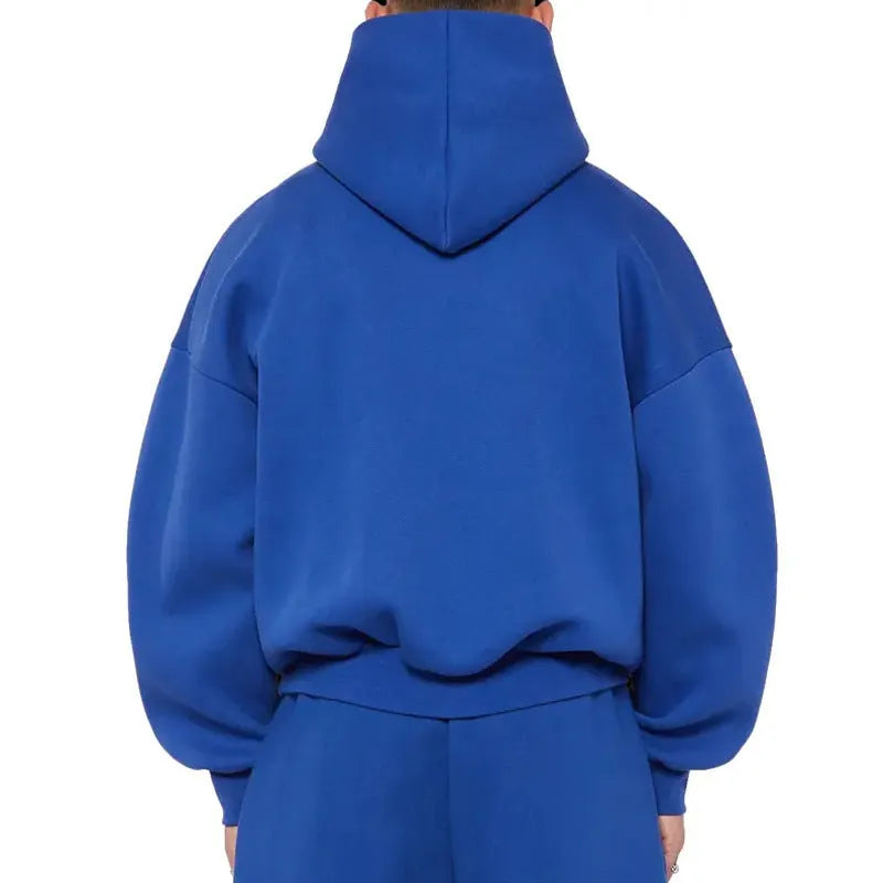 Man wearing a solid colour fleece-lined cotton pullover sweater with a wool lining.