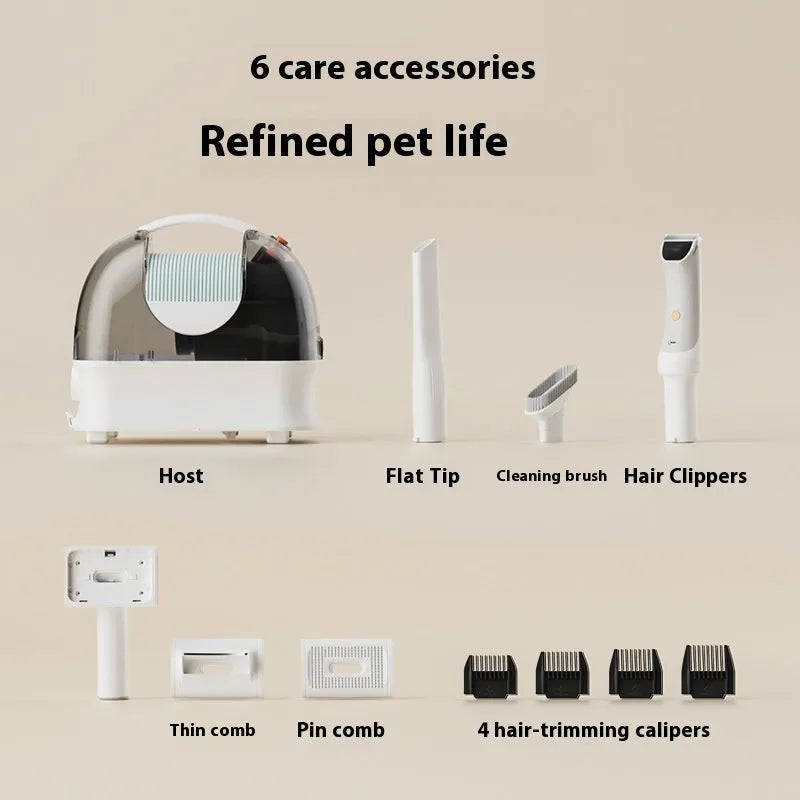 Pink white pet hair vacuum cleaner with grooming accessories including electric shear and combs