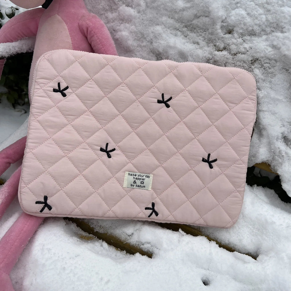 Embroidered rhombus bow detail on nylon laptop storage bag in light blue colour
