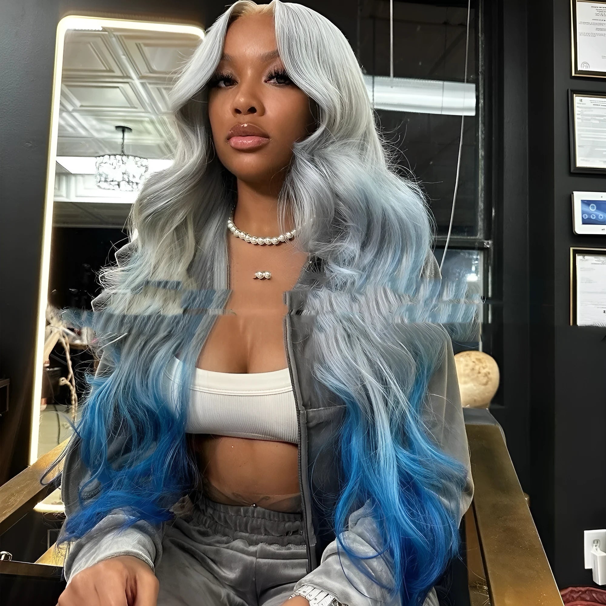 Grey-blue gradient human hair wig with Swiss lace front on display stand