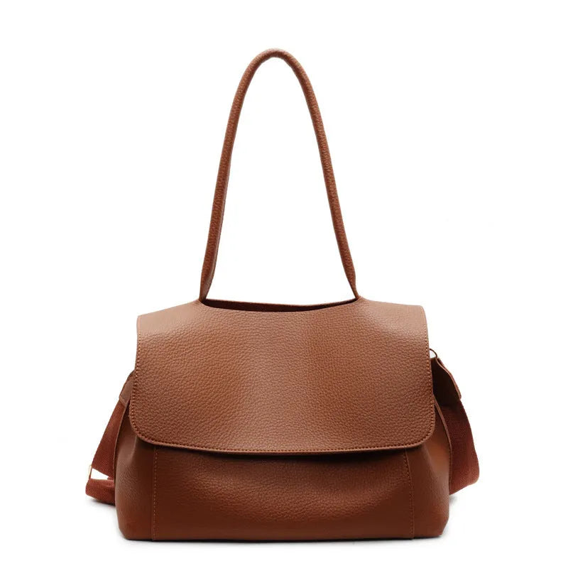 Women's vintage style square tote bag in PU leather with double shoulder straps.