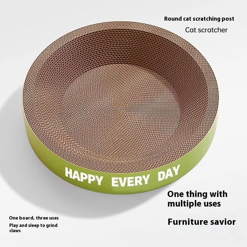 A simple green round woven cat scratching board nest bed on a floor.