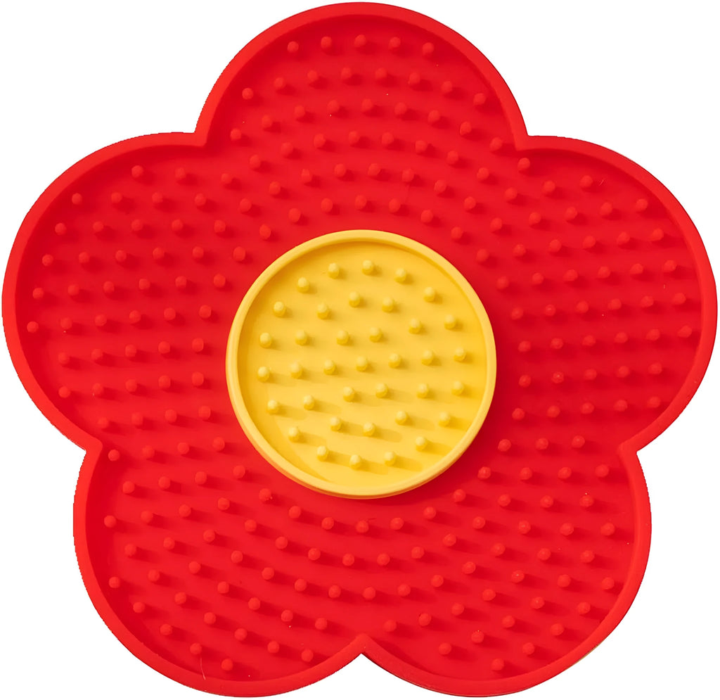Flower-shaped silicone pet lick mat with suction cups on the base, shown in a choice of colours.