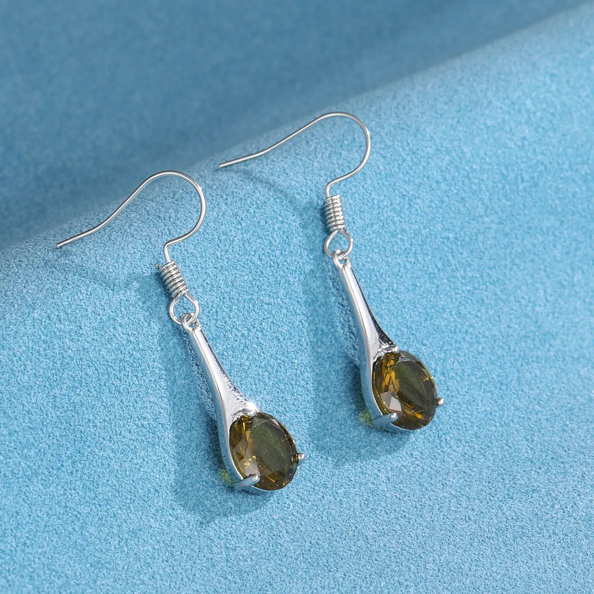 Olive green topaz drop shape earrings with minimalist design and electroplated finish