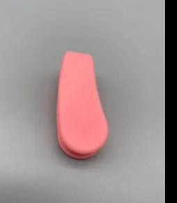 Tiger mouth massage clip multi-function acupoint massager in black on a hand, showing placement between thumb and index finger