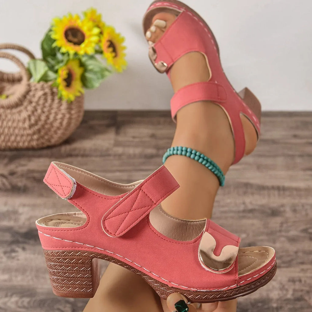 Women's light brown Roman sandals with multiple straps and Velcro fastening on a rubber sole.