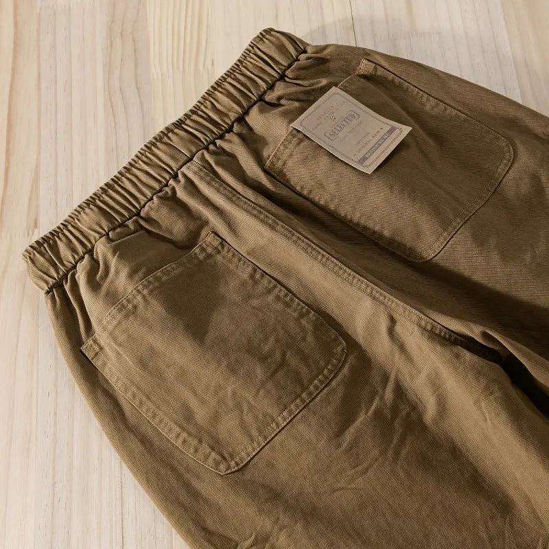 Men's cotton overalls with ankle banding and drawstring waist in army green