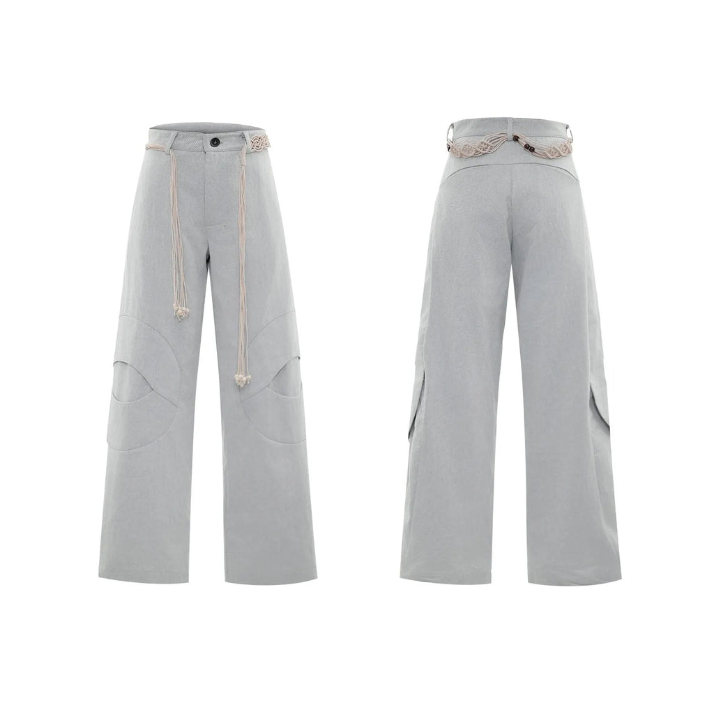 Men's heavyweight cotton straight-leg jeans with 3D cutting, decorative zipper details, and tassel accents in dark colours