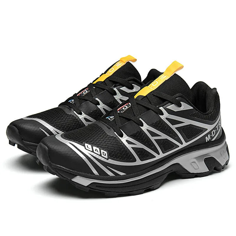 Men's and women's low-top round toe hiking shoes in artificial leather with a lace-up front.
