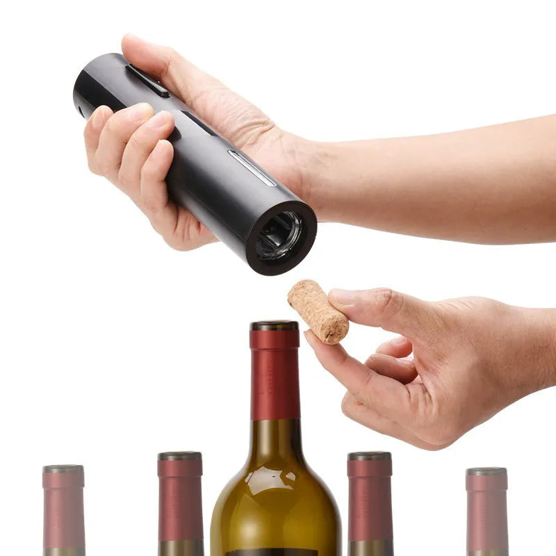 Red electric wine bottle opener set with ABS plastic base, decanter, and vacuum stopper