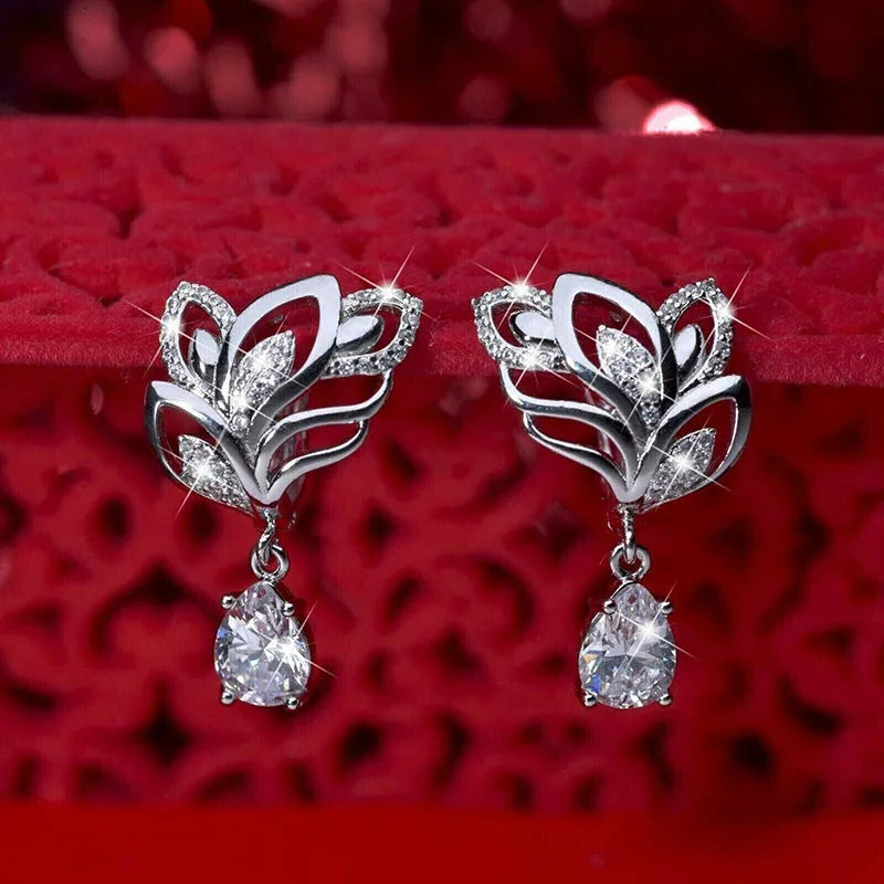 Leaf inlaid drop zircon earrings for women, copper floral design with platinum finish, white gold colour option