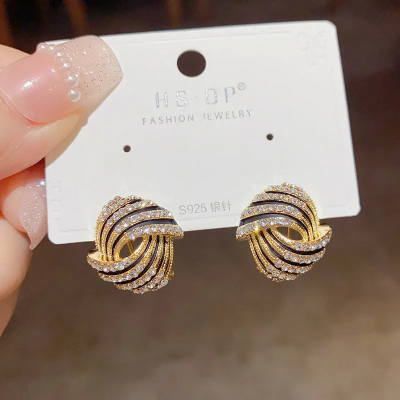Super-flashing rhinestone ear studs with thick real gold plating on copper, geometric ring shape for women