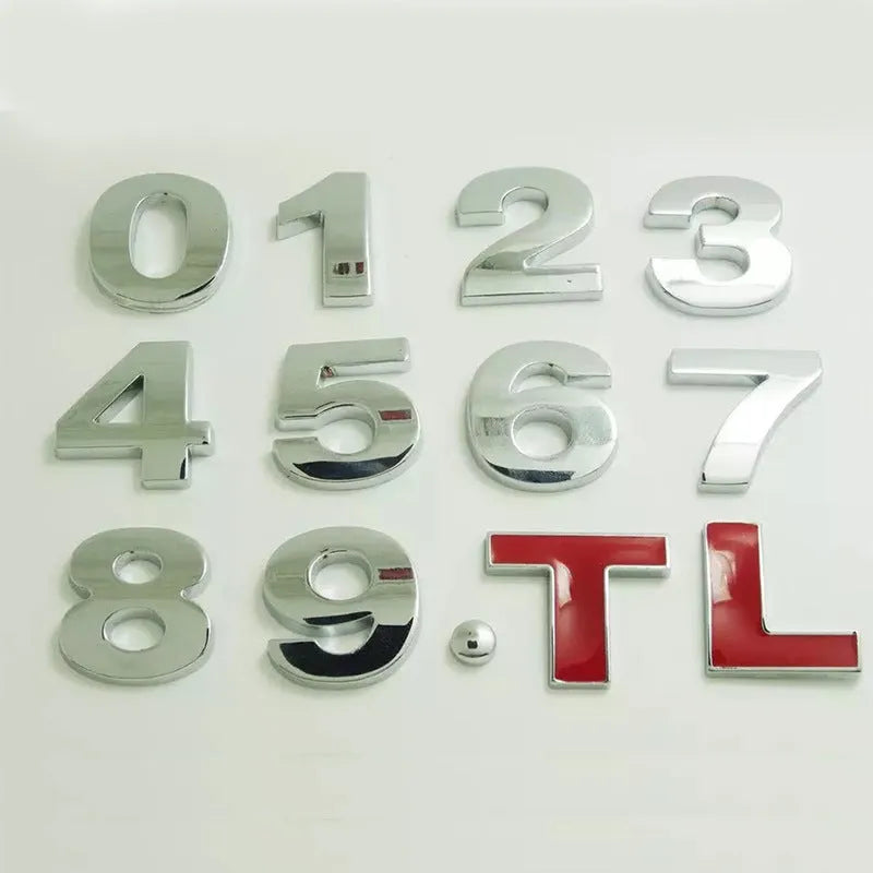 Close-up of a 3D metal zinc alloy car letter sticker in silver, showing its raised profile.