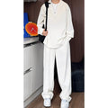 Men's black casual two-piece suit with long sleeve polo shirt and matching trousers slim fit