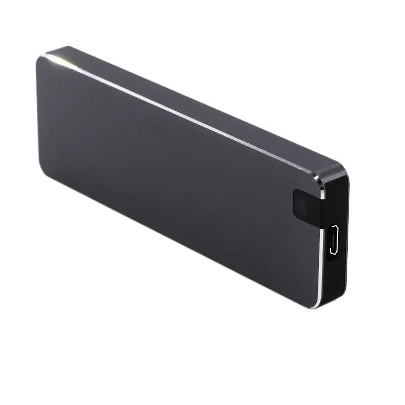 White external solid state drive with metal casing and USB cable, showing compact size for portable storage.