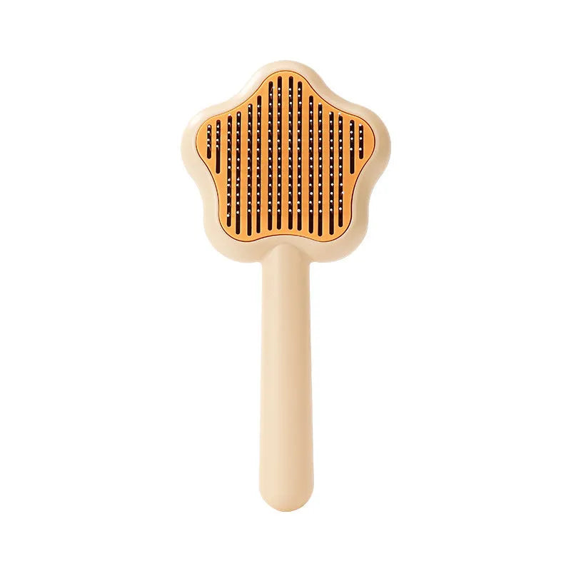 Magic wand cat comb with stainless steel needle teeth and self-cleaning mechanism in green colour