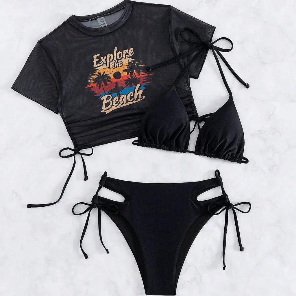 Women's three-piece bikini swimsuit set in black, shown with short sleeves and matching pants.