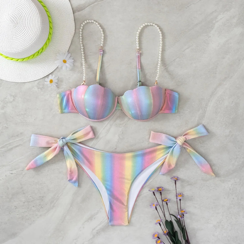 Women's rainbow coloured split tied bikini swimsuit on mannequin