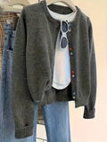 Dark grey women's polyester cardigan with button front and long sleeves.