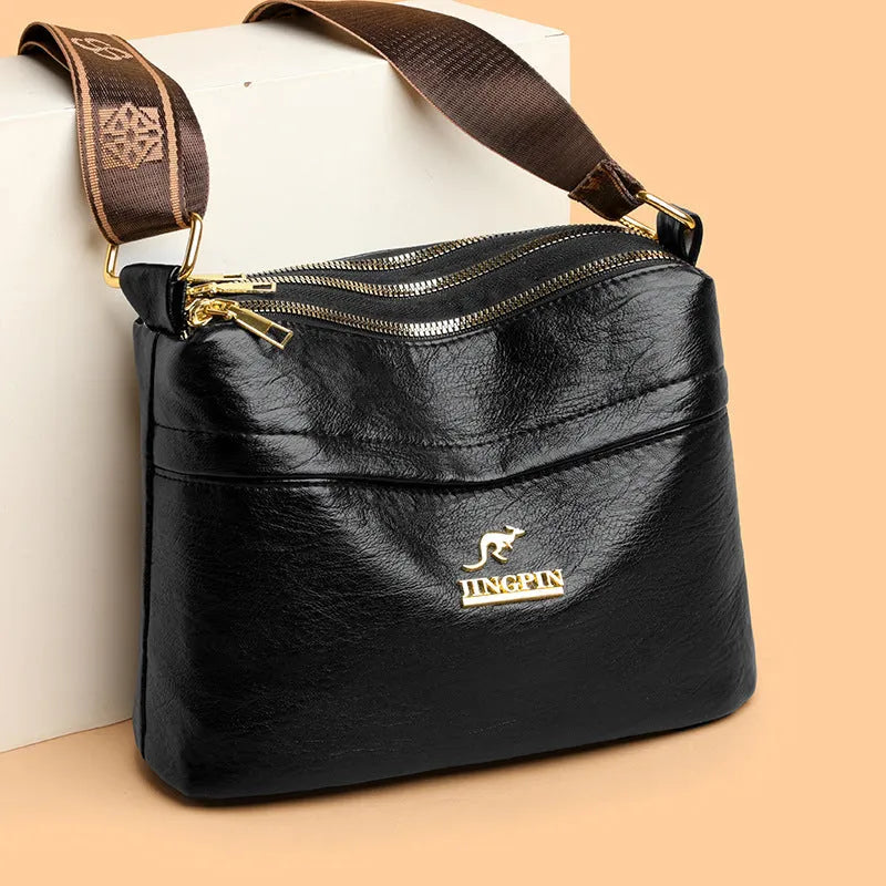 Brown PU leather cross body messenger bag with multiple compartments and sandwich pocket design